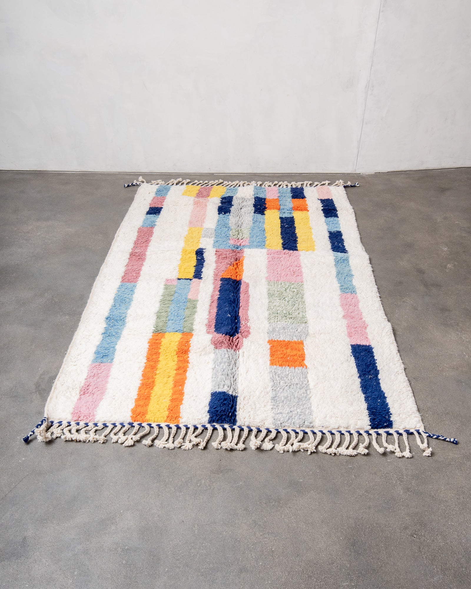 Modern, designer, handcrafted Berber rug from Morocco. Beniourain carpet with beautiful colours and patterns and fluffy wool texture.
